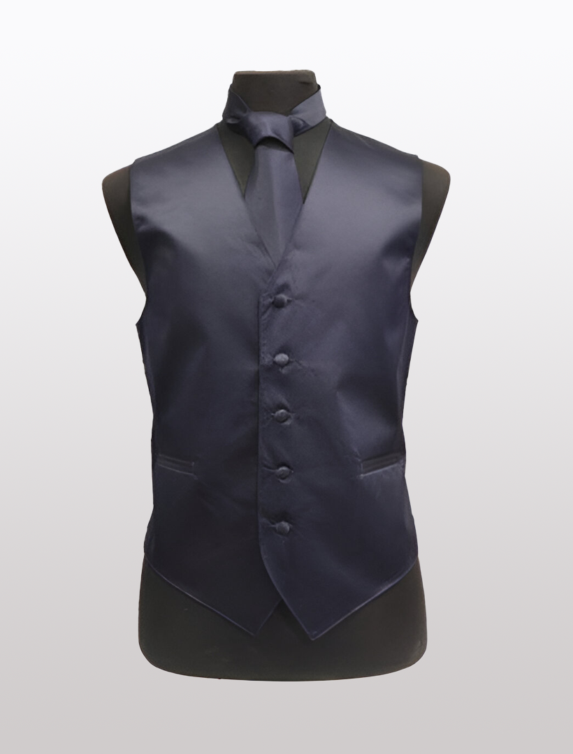 On a neutral background, a black mannequin showcases the Men's Solid Satin Navy Tuxedo Vest from Ckl, accompanied by a matching tie. The vest features buttons, an adjustable strap, and two pockets.