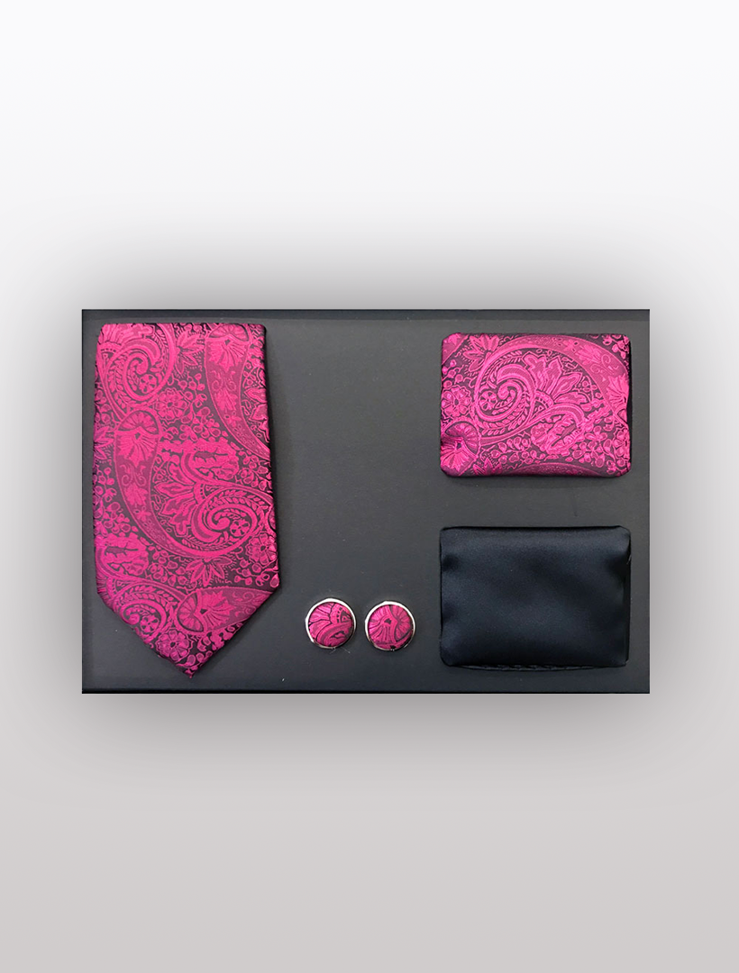 Introducing the Men's Four Piece Fuchsia Paisley Patterned Gift Box by Vesuvio Napoli, showcasing a slim fit fuchsia paisley tie, matching pocket square, elegant cufflinks, and a solid black pocket square—ideal for any formal occasion.