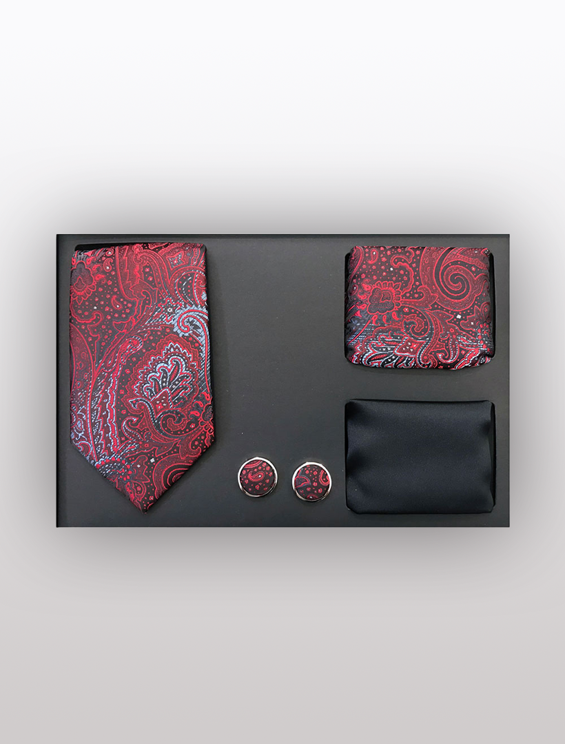 Men's Four Piece Black and Red Paisley Patterned Gift Box by Vesuvio Napoli includes a slim fit tie, matching pocket square, cufflinks, and an additional black pocket square, all elegantly packaged for formal events.