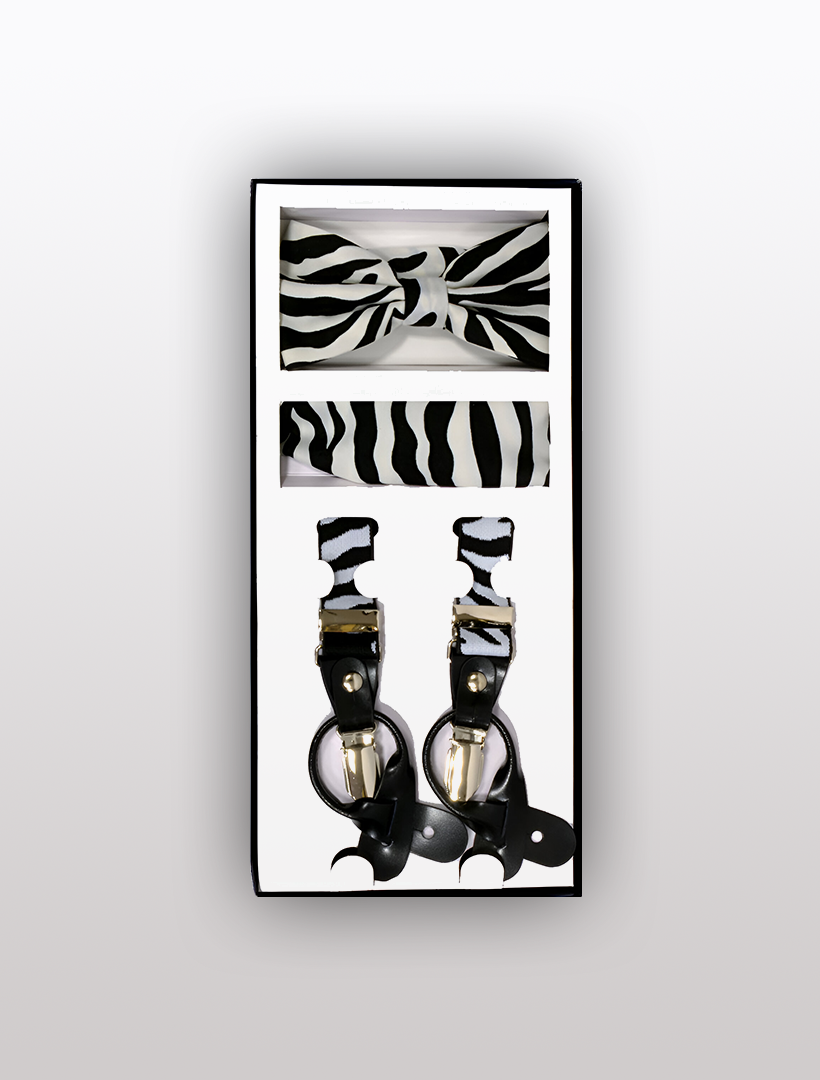 Introducing the Men's Skinny Zebra 3 Piece Suspenders Set by Vesuvio Napoli, a chic ensemble featuring a zebra-print bow tie, coordinating pocket square, and versatile adjustable suspenders with black leather attachments.