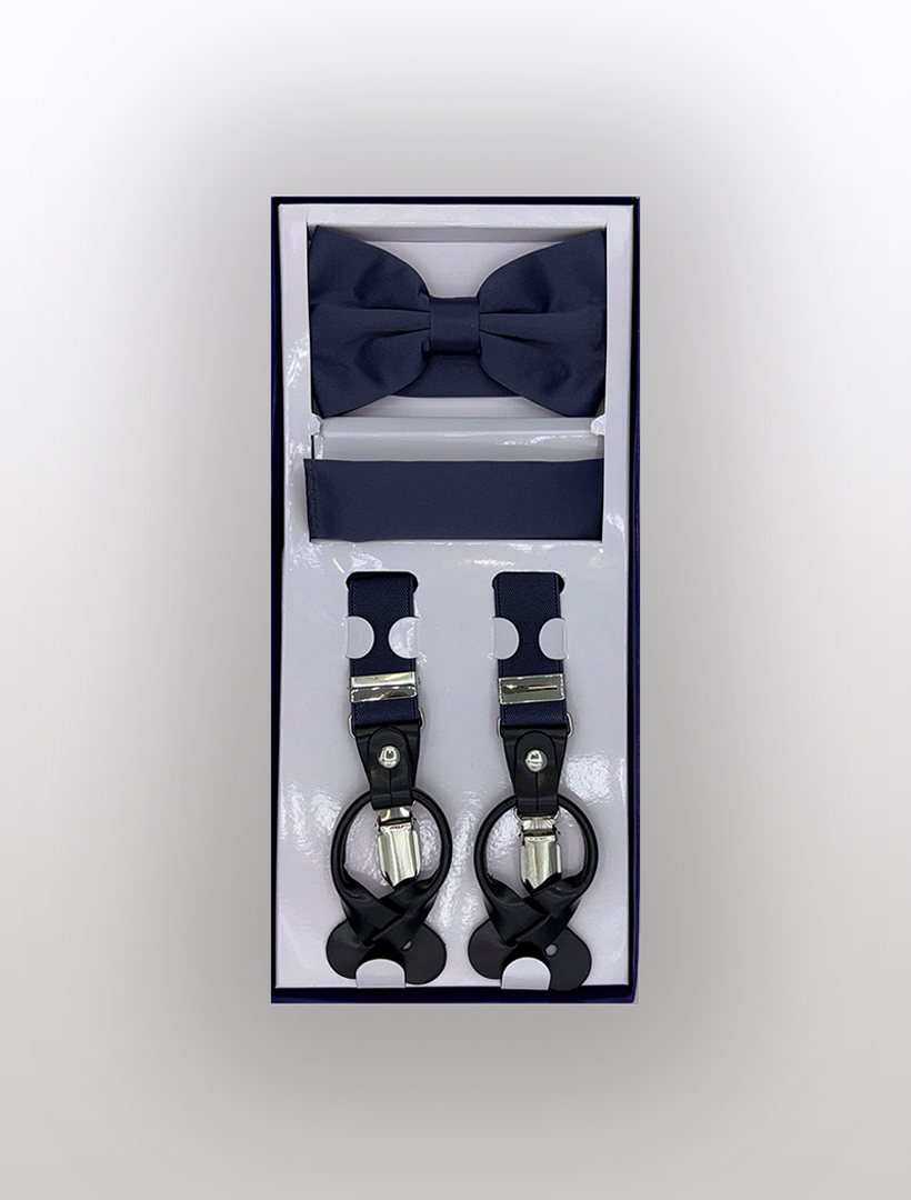 Introducing the Men's Skinny Navy 3 Piece Suspenders Set by Vesuvio Napoli, featuring a classic navy blue bow tie, a matching pocket square, and adjustable suspenders with chic black straps adorned with white polka dots.