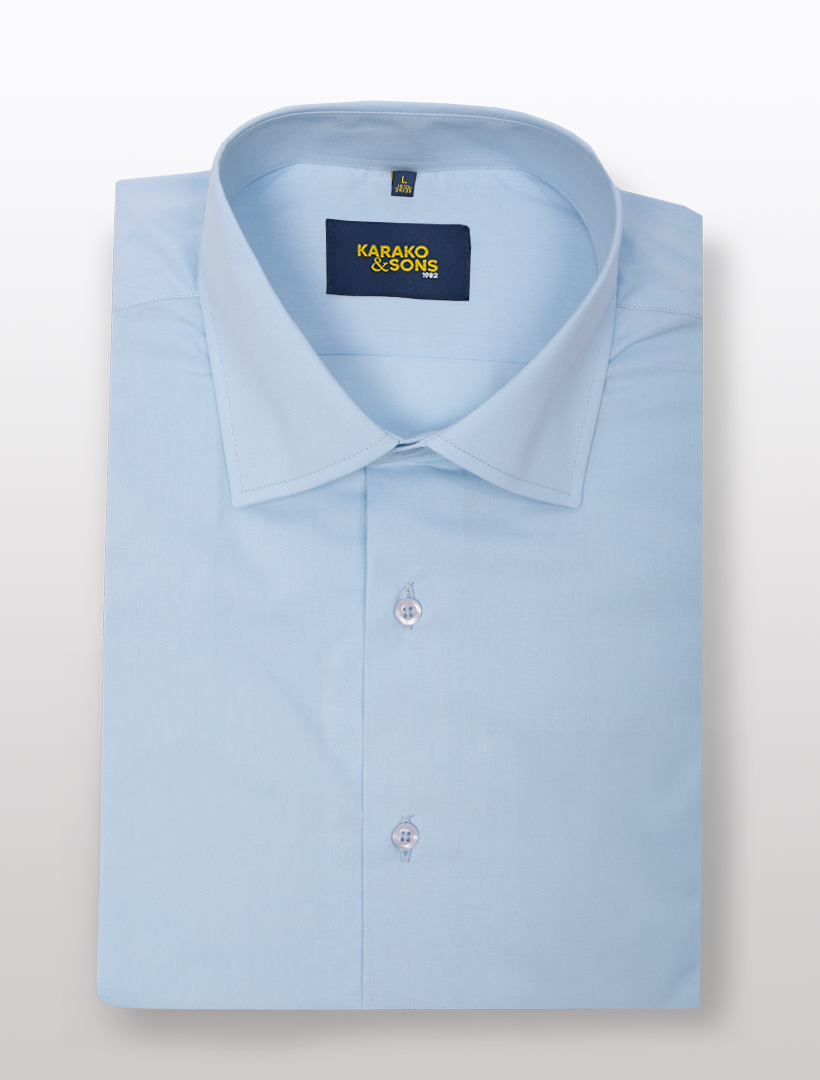 The Men's Blue Bamboo Wrinkle-Free Slim Fit Dress Shirt from Karako & Sons provides both style and convenience with its perfectly tailored design.