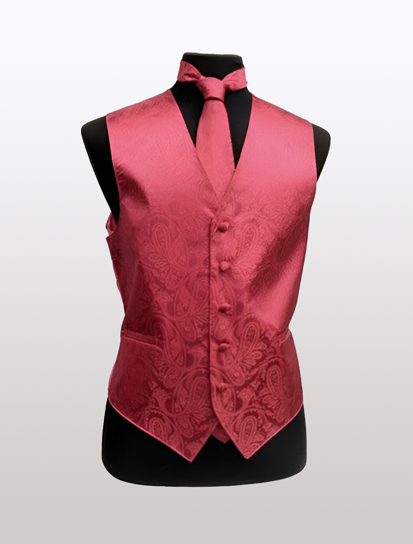 The Men's Paisley Coral Tuxedo Vest by Ckl, featuring an adjustable strap and matching tie, is gracefully showcased on a black mannequin against a simple backdrop.