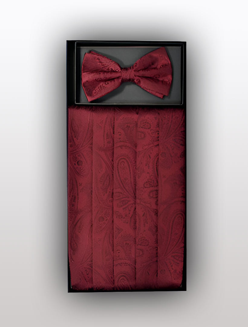 Experience sophistication with the Vesuvio Napoli Men's Silk Paisley Burgundy Cummerbund and Bow Tie set. Crafted from 100% silk, this luxurious ensemble arrives in a sleek black box and features a maroon paisley pattern that adds an elegant touch to any tuxedo.