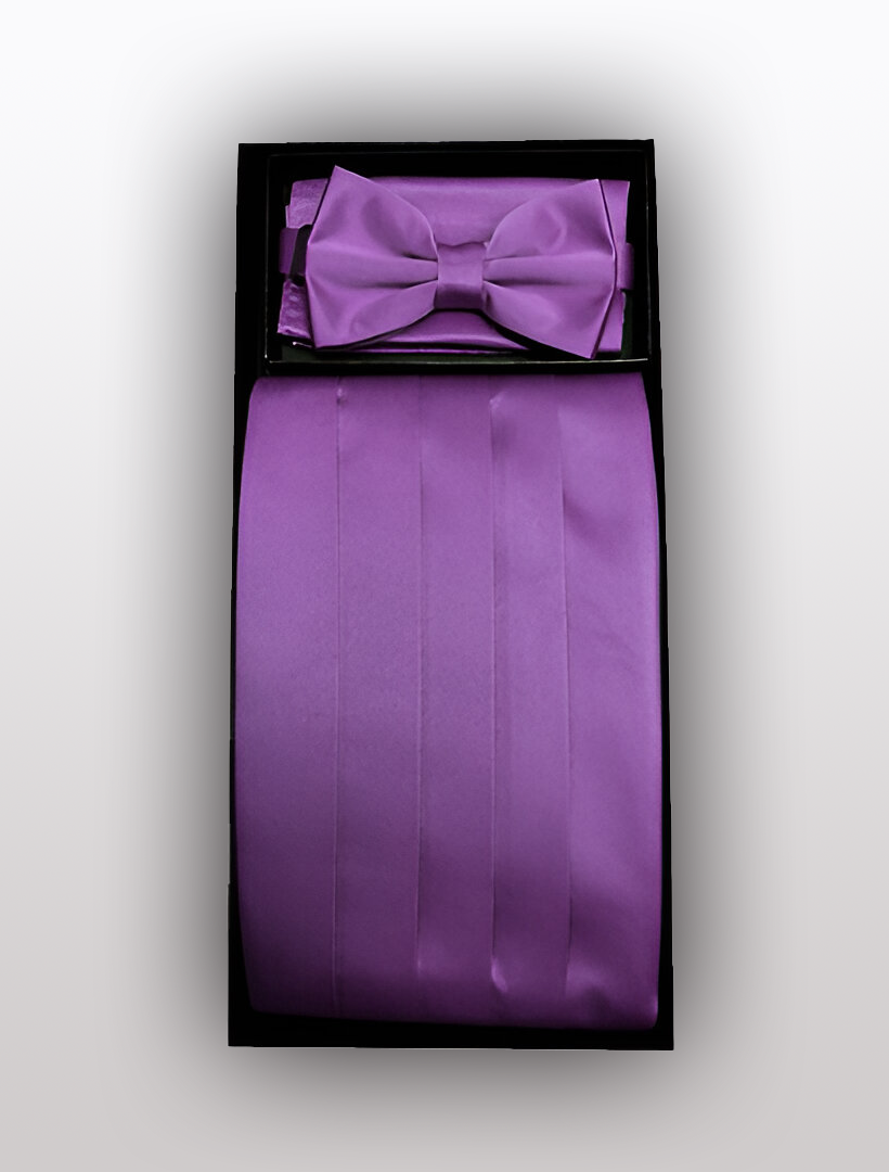 Introducing the Men's Silk Eggplant Cummerbund with Bow Tie from Vesuvio Napoli. This refined formal accessory set is expertly crafted from 100% silk and includes a bow tie, cummerbund, and pocket square. Neatly packaged in a box, it's the perfect addition to any tuxedo attire for special occasions.