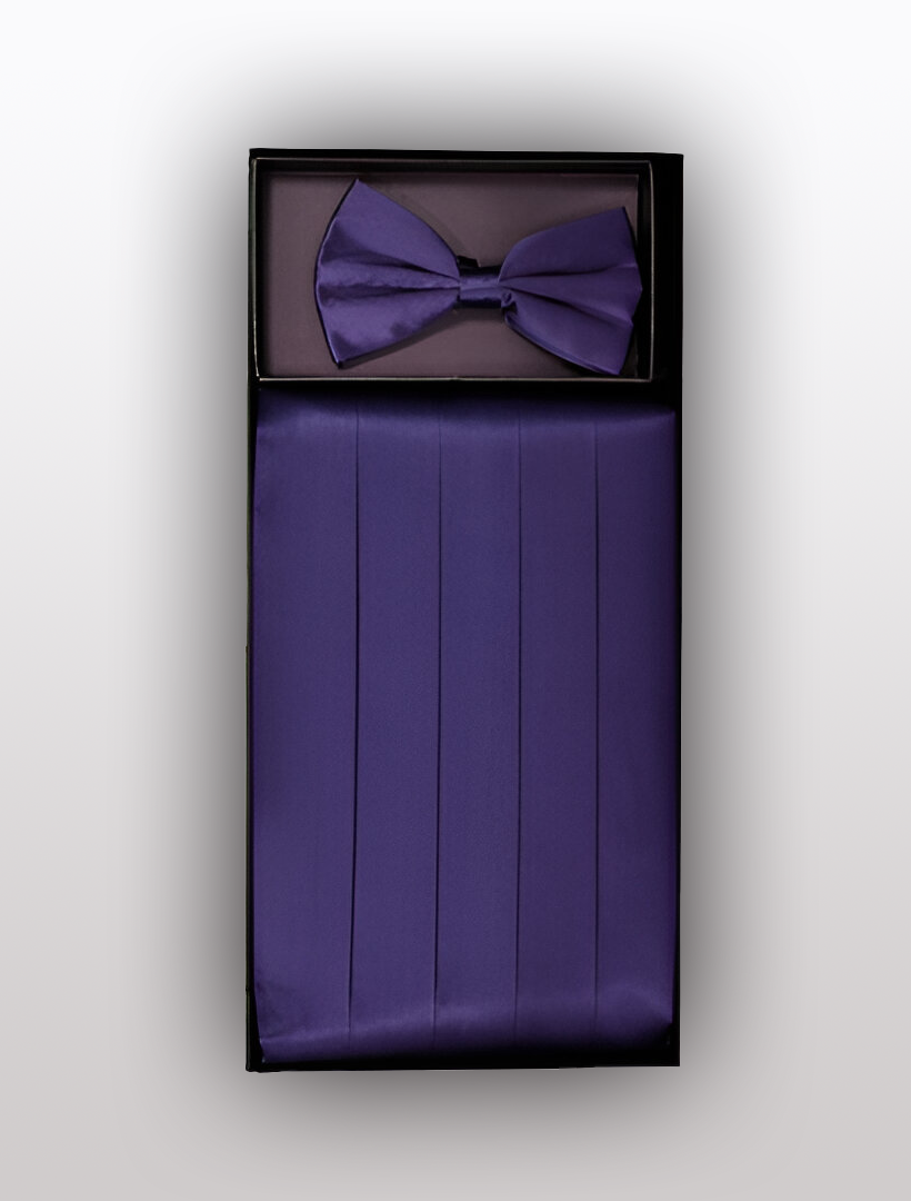Introducing the Vesuvio Napoli Men's Silk Grape Cummerbund with Bow Tie: a boxed set designed to elevate any tuxedo ensemble with its luxurious silk material and elegant hue.