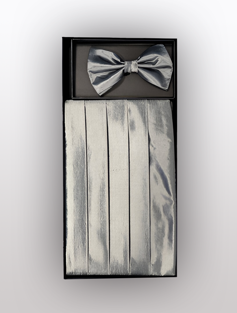 The Vesuvio Napoli Men's Silk Silver Cummerbund with Bow Tie is elegantly presented in a sleek black box, featuring a matching cummerbund with 4 pleats.