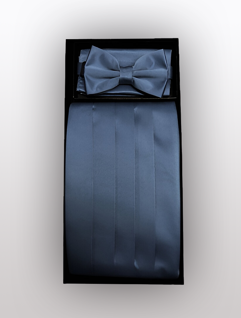 A stylish boxed set from Vesuvio Napoli, featuring the Men's Poly Charcoal Cummerbund with Bow Tie & Hanky, includes a sophisticated gray bow tie, an adjustable elastic band cummerbund, and a matching pocket square against a sleek black background.