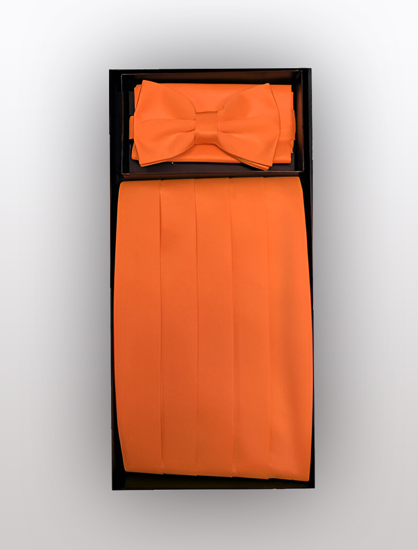 Vesuvio Napoli's Men's Poly Orange Cummerbund with Bow Tie & Hanky is stylishly packaged in a sleek black box, making it an ideal choice for enhancing tuxedos and infusing formal attire with a vibrant flair.