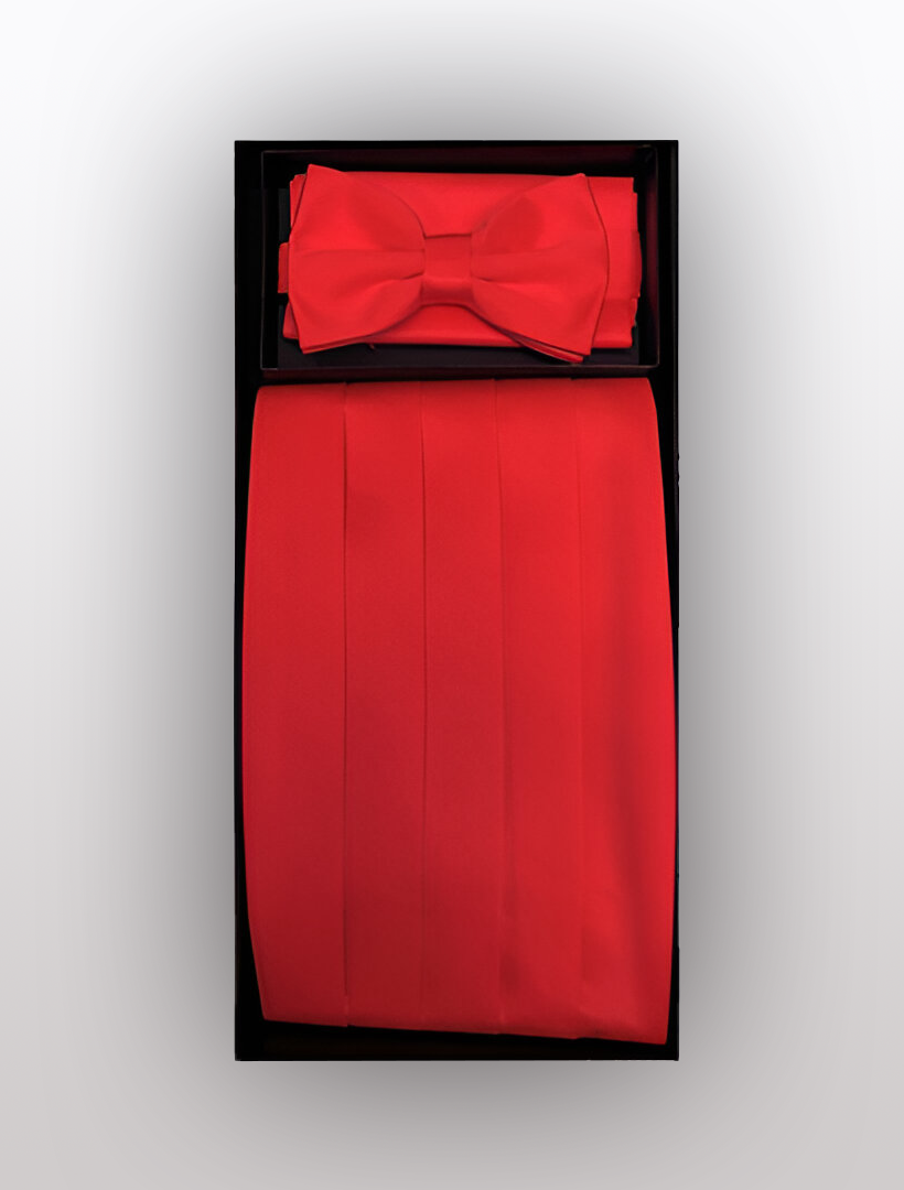 Introducing the Vesuvio Napoli Men's Poly Red Cummerbund with Bow Tie & Hanky, a sophisticated boxed set that includes a striking red bow tie and a coordinating cummerbund with an adjustable elastic band, beautifully displayed against a black backdrop. Ideal for elevating any tuxedo ensemble with timeless elegance.