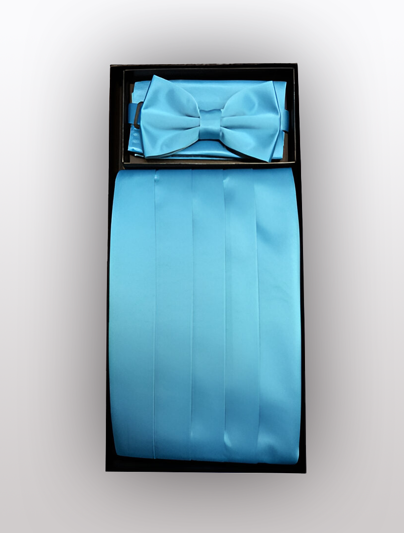 The Men's Poly Turquoise Cummerbund with Bow Tie & Hanky by Vesuvio Napoli is a boxed set of formal wear accessories, perfect for pairing with a tuxedo. It includes a bow tie, cummerbund, and pocket square, all elegantly displayed against a white background.