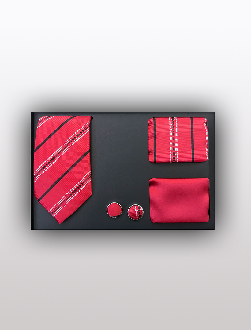 The Vesuvio Napoli Men's Four Piece Red Stripe Patterned Gift Box is neatly arranged against a gray background, showcasing a slim fit tie set that includes a tie, pocket square, cufflinks, and a solid red silk pocket square—perfect for formal events.