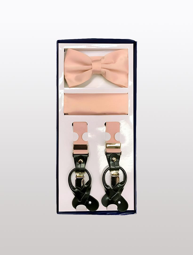 Discover the Men's Skinny Peach 3 Piece Suspenders Set by Vesuvio Napoli, a stylish gift collection that includes a pink bow tie, a matching pocket square, and adjustable Y-back brown suspenders with elegant black leather accents.