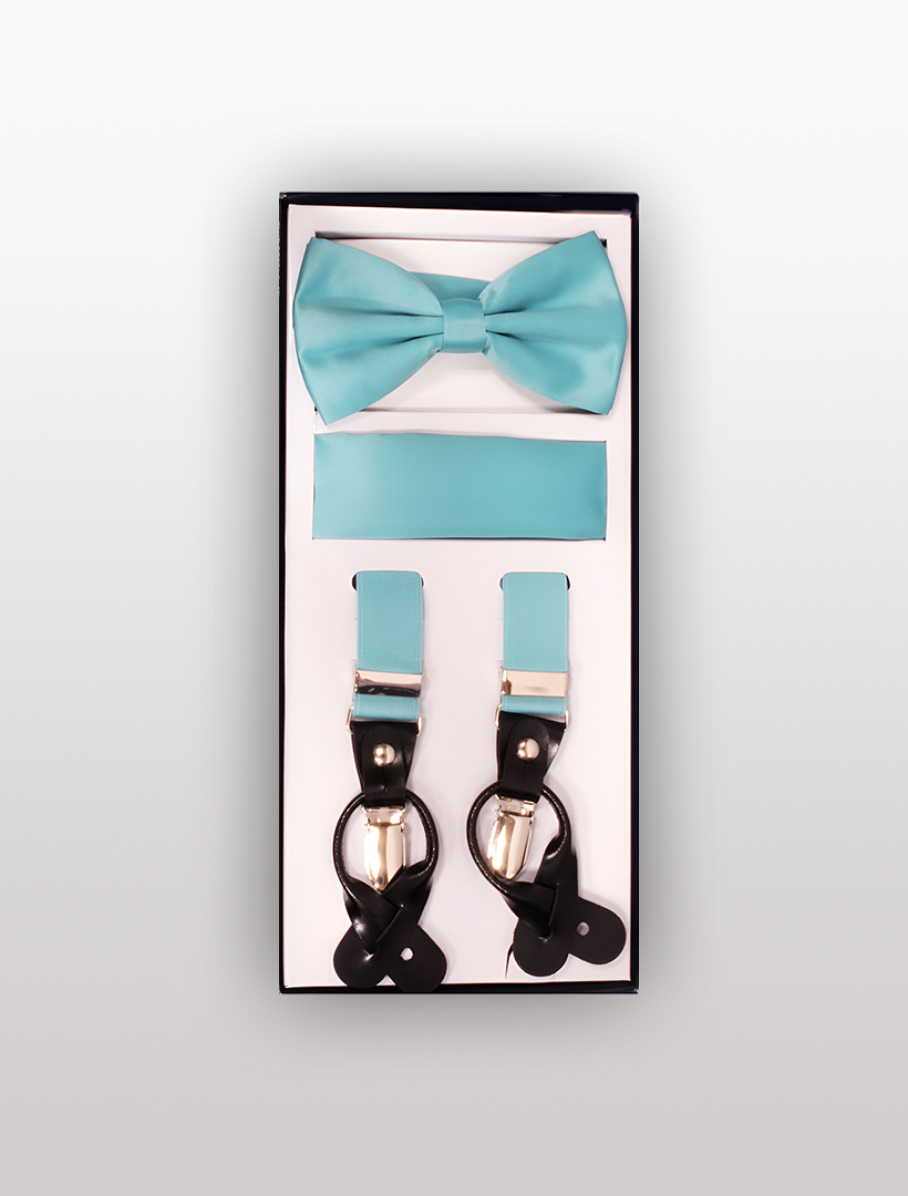 The Vesuvio Napoli Men's Skinny Aqua 3 Piece Suspenders Set includes a stylish turquoise bow tie, pocket square, and adjustable Y-back suspenders with black leather accents and silver clips, all elegantly packaged in a sleek black box.