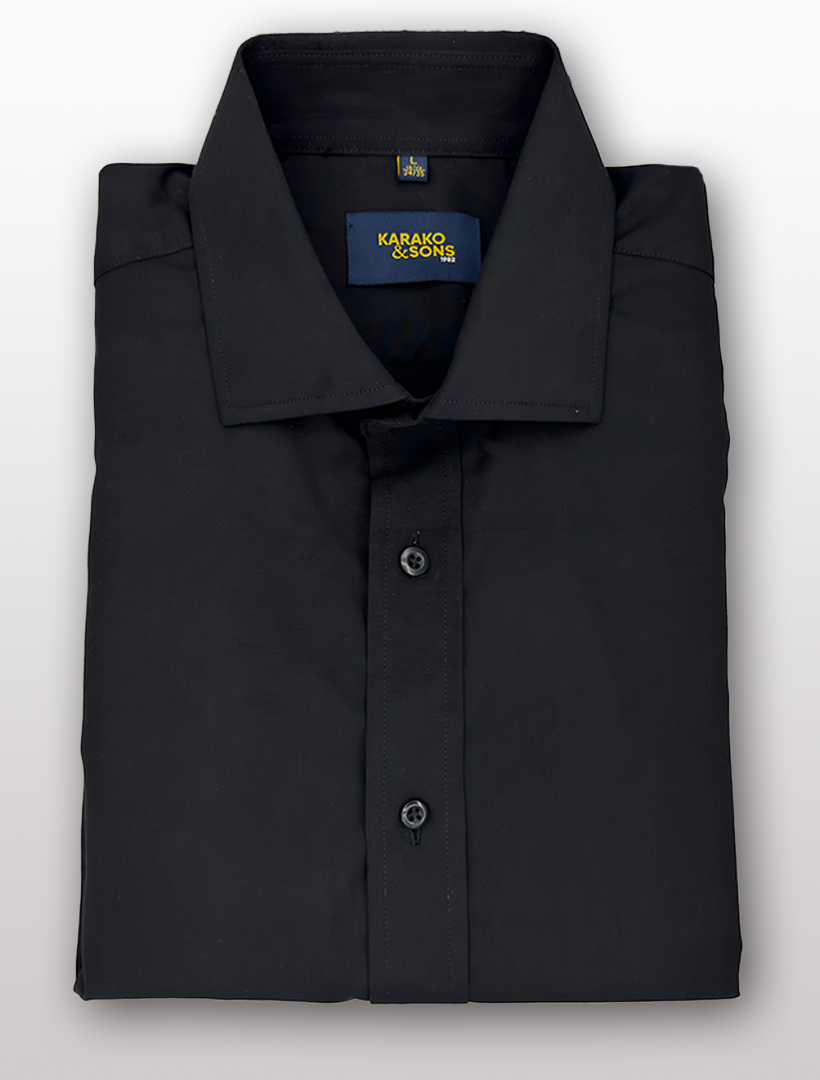 A folded black slim-fit dress shirt labeled "Karako & Sons," crafted from bamboo fabric, featuring a collar, button closures, and a wrinkle-free finish.