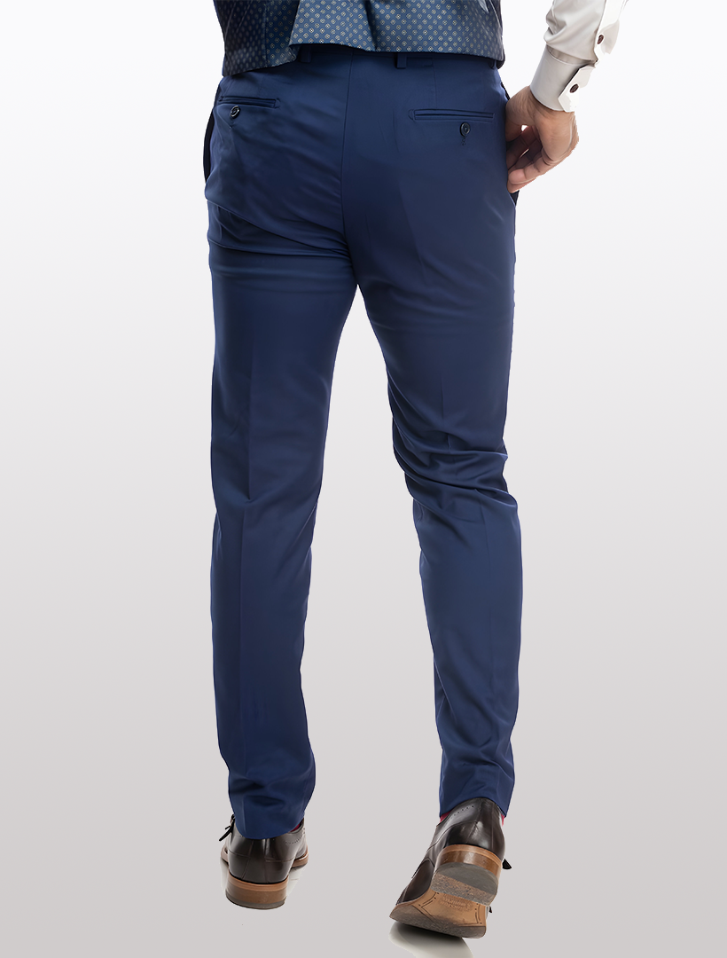 A man is seen from the back standing on a light surface, wearing Karako Separate Blue Men&