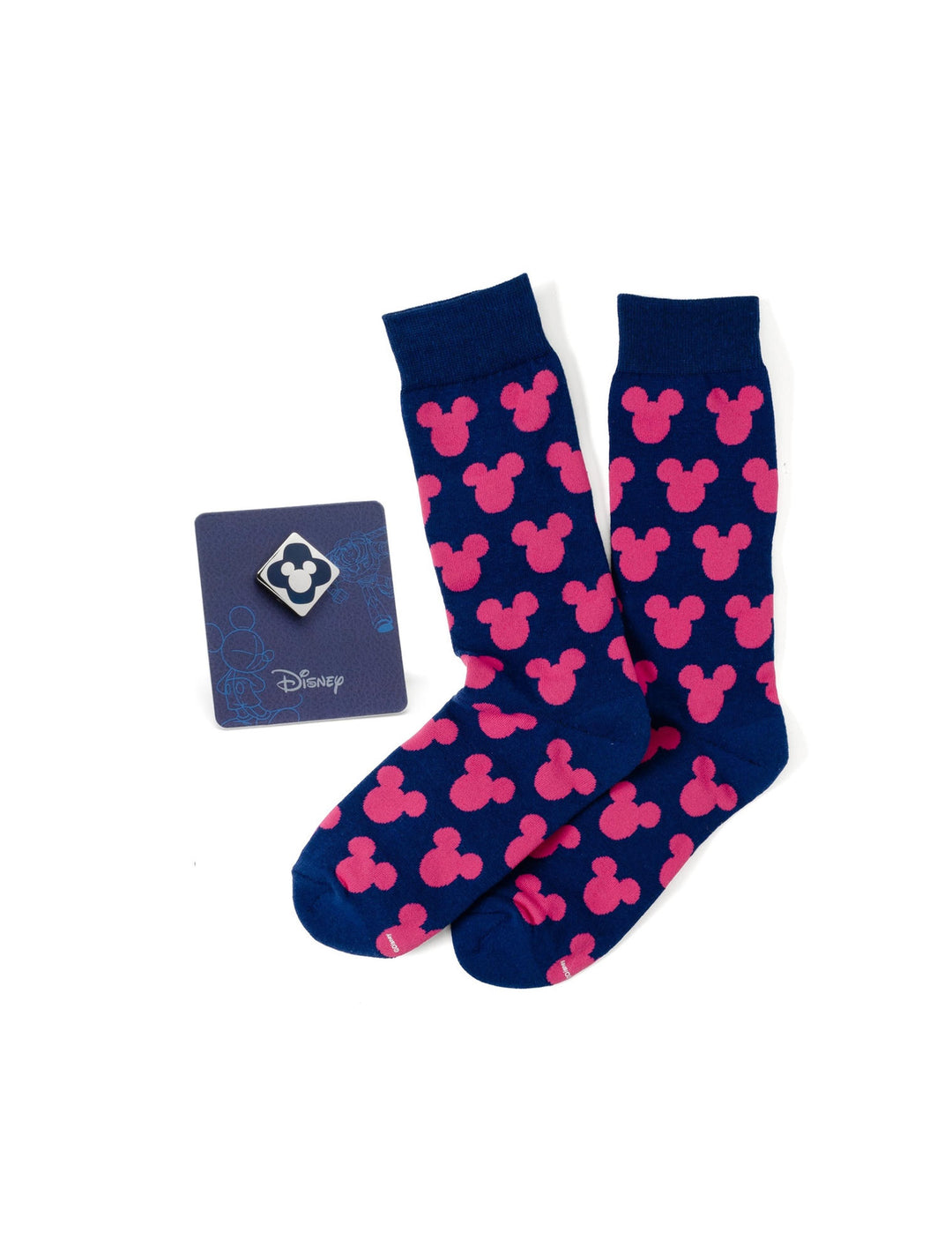 Disney Mickey Mouse Silhouette Pink Sock and Mickey Blue Lapel Pin Gift Set featuring navy blue crew socks with a pink Mickey Mouse silhouette pattern and a square enamel Mickey lapel pin.