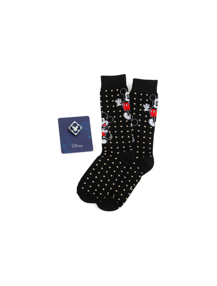 A Disney Mickey Mouse Dot Socks and Blue Lapel Pin Gift Set consisting of black socks patterned with tan dots and Mickey figures, alongside a square blue lapel pin featuring a Mickey Mouse icon.