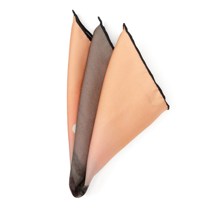 A folded Star Wars Tatooine Binary Sunset Pocket Square featuring an orange and brown landscape with two suns.