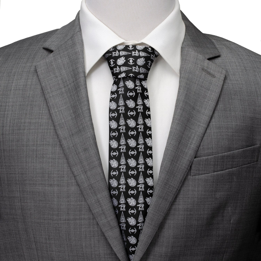 Star Wars Ships Black Tie with a repeating pattern of white starships, worn with a white collared shirt and a gray suit jacket.