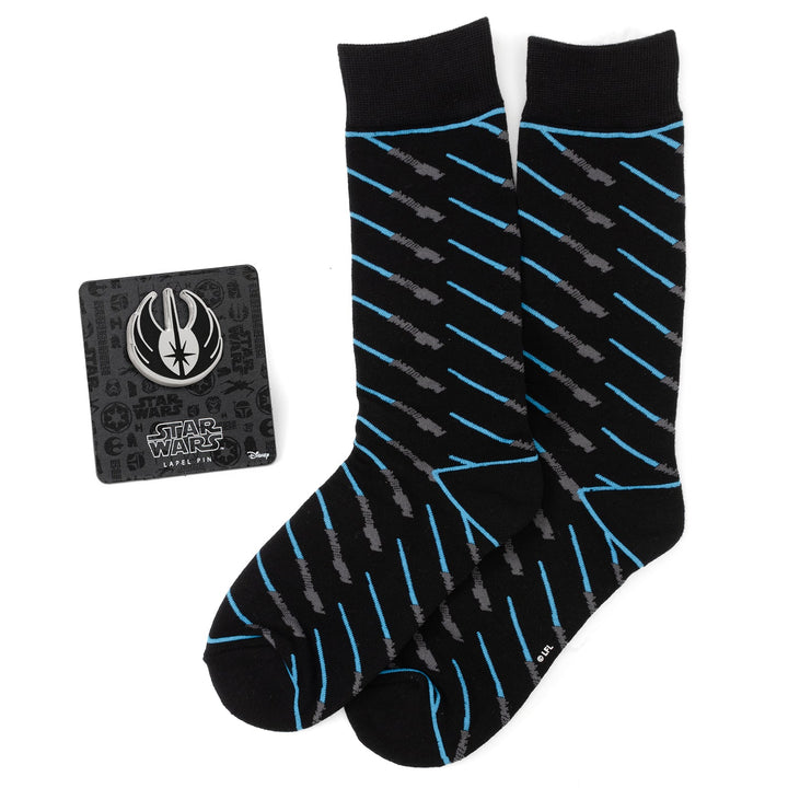 Star Wars Obi-Wan Kenobi Blue LIGHTSABER Pattern Black Dress Socks with Jedi Crest Lapel Pin Gift Set featuring black crew socks with diagonal blue lightsabers and a silver Jedi symbol lapel pin.