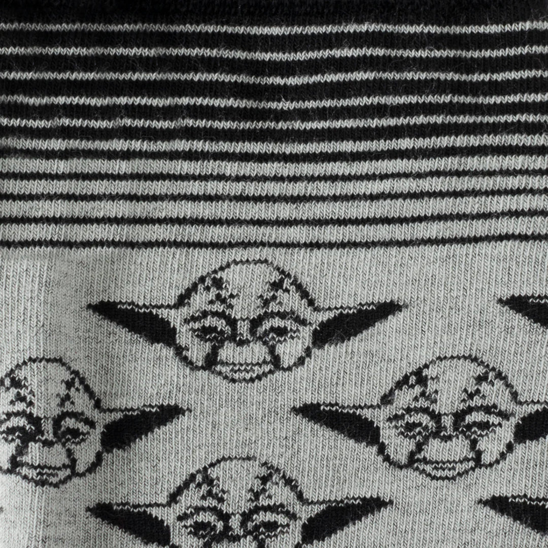 Star Wars Yoda Gray and Black Ombre Pattern Dress Socks featuring a repeating pattern of Yoda faces, with a section of black and gray horizontal stripes at the top.