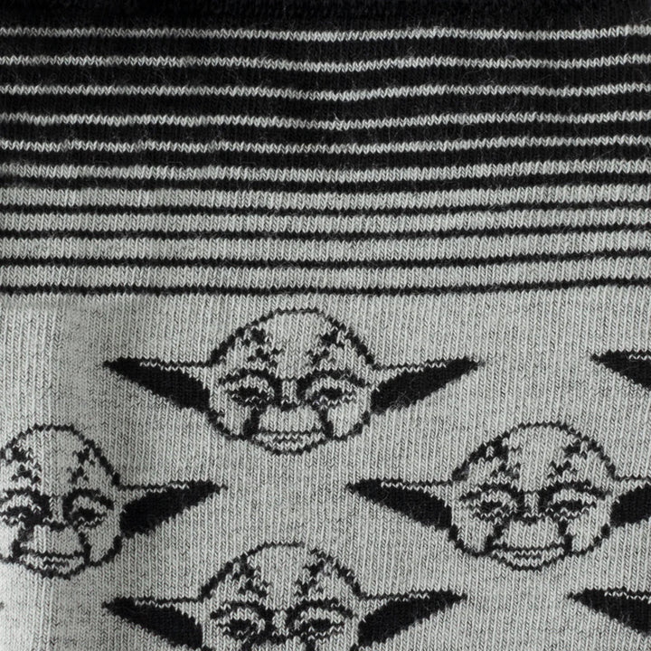 Star Wars Yoda Gray and Black Ombre Pattern Dress Socks featuring a repeating pattern of Yoda faces, with a section of black and gray horizontal stripes at the top.
