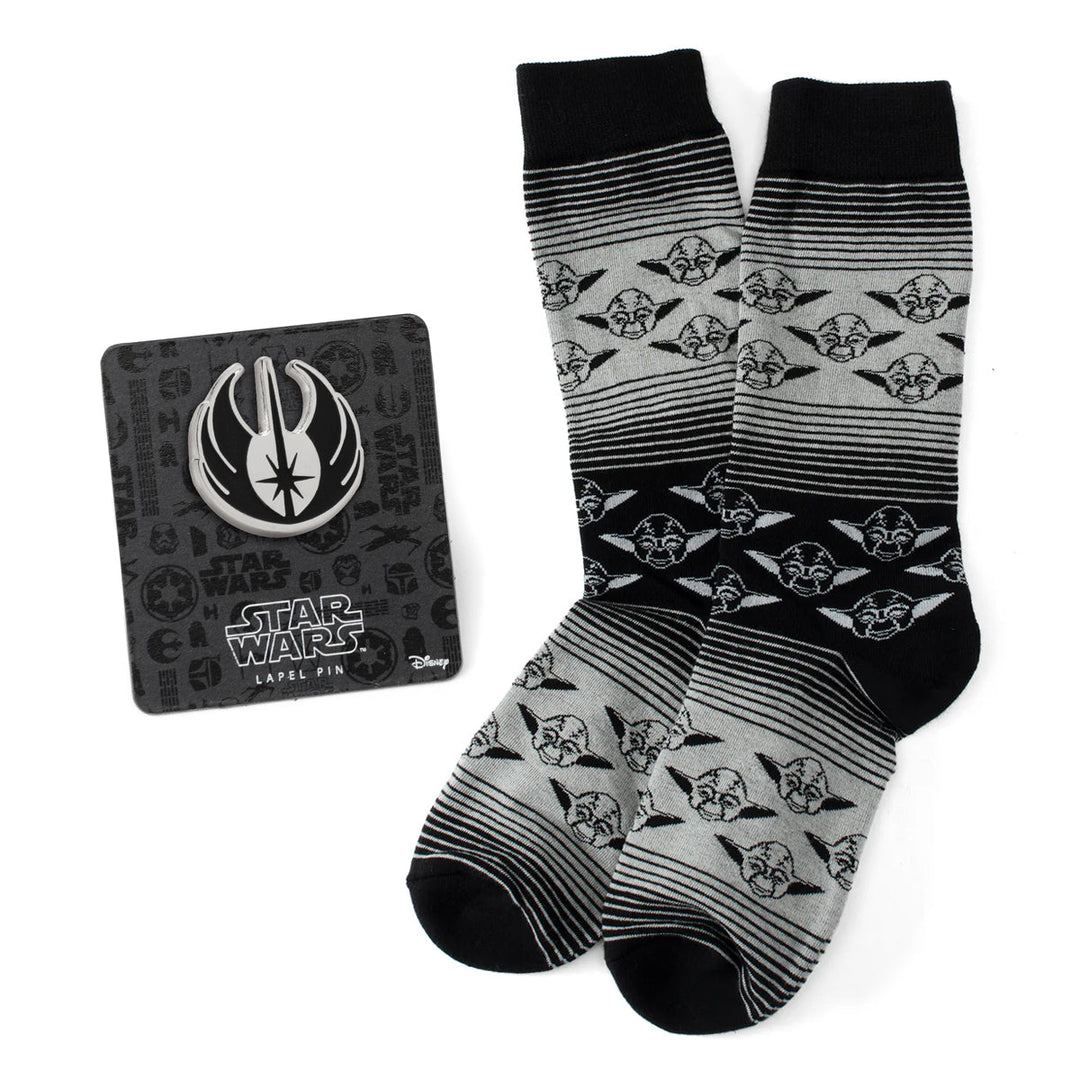 Cufflinks.com Star Wars Yoda Gray and Black Ombre Pattern Dress Socks and a circular Jedi crest lapel pin on a display card.