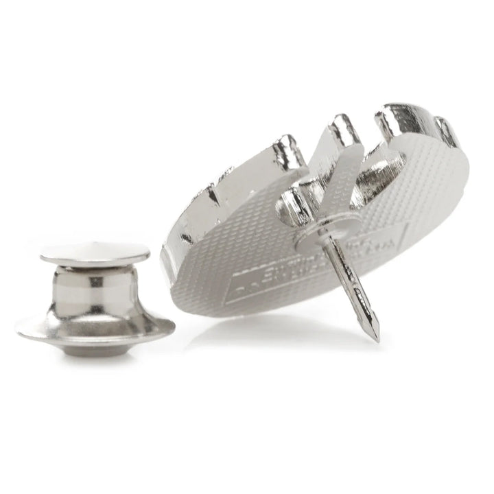 A silver Millennium Falcon lapel pin from the Star Wars Yoda Green and Black Ombre Pattern Dress Socks with Jedi Crest Lapel Pin set, shown with its clutch back detached.