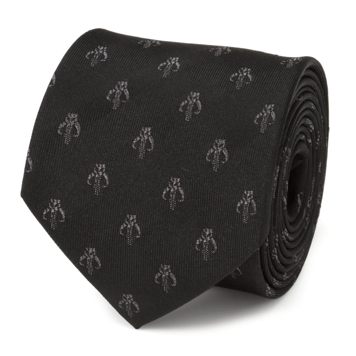 Star Wars Mandalorian Mythosaur Black Silk Tie rolled up to reveal a repeating gray Mythosaur skull pattern.