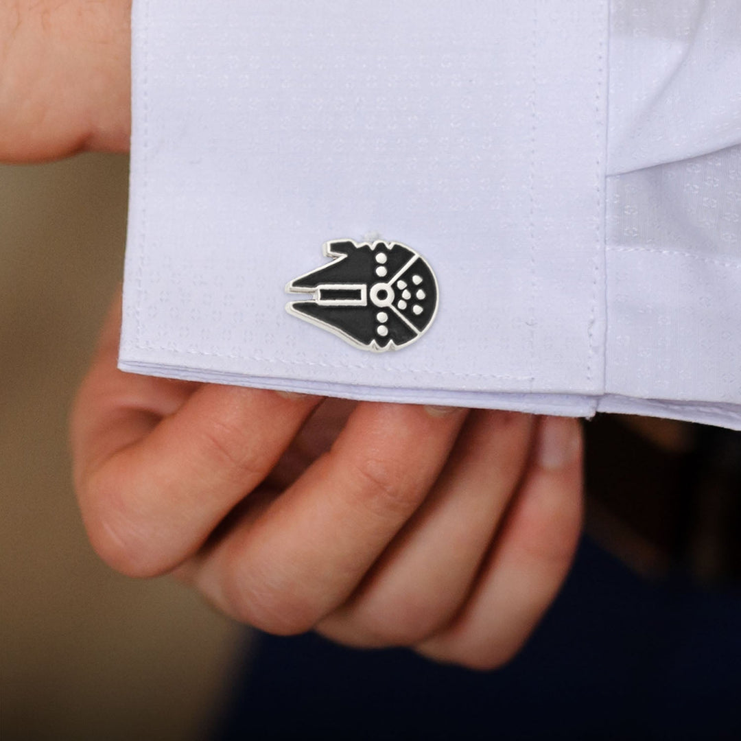 Silver and black Star Wars Millennium Falcon Silver Inlaid Cufflinks fastened to a white dress shirt cuff.