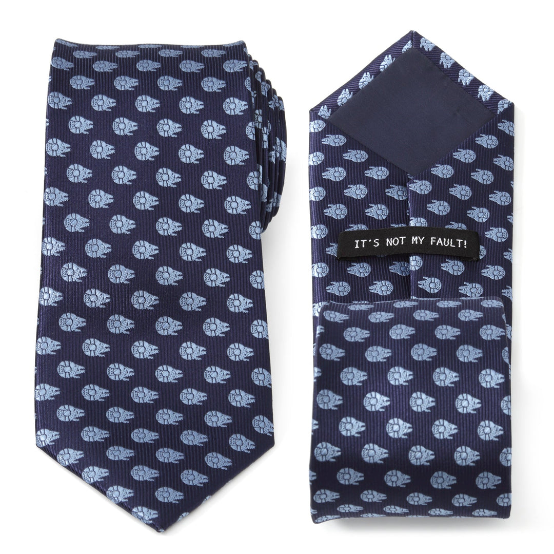 Star Wars Millennium Falcon Blue Tonal Tie featuring a dark blue fabric with a repeating light blue Millennium Falcon pattern and an “IT’S NOT MY FAULT!” label on the back.