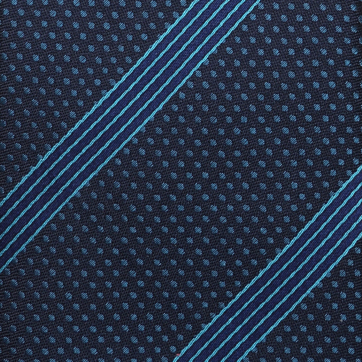 Star Wars Millennium Falcon Blue Striped Tie in dark blue silk with a repeating pattern of Millennium Falcon silhouettes and light blue diagonal stripes.