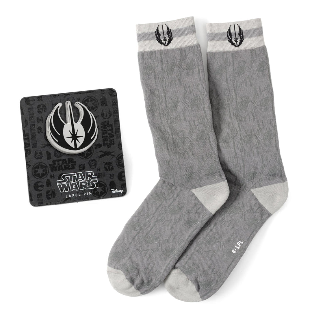 Star Wars Obi-Wan Kenobi Gray Socks and Lapel Pin Gift Set featuring gray crew socks with a repeating Jedi Order symbol pattern and a matching metal lapel pin displayed on a card.