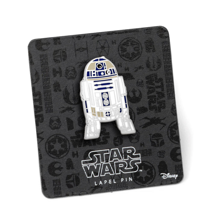 White and blue Star Wars R2-D2 Lapel Pin enamel pin on a black branded backing card.
