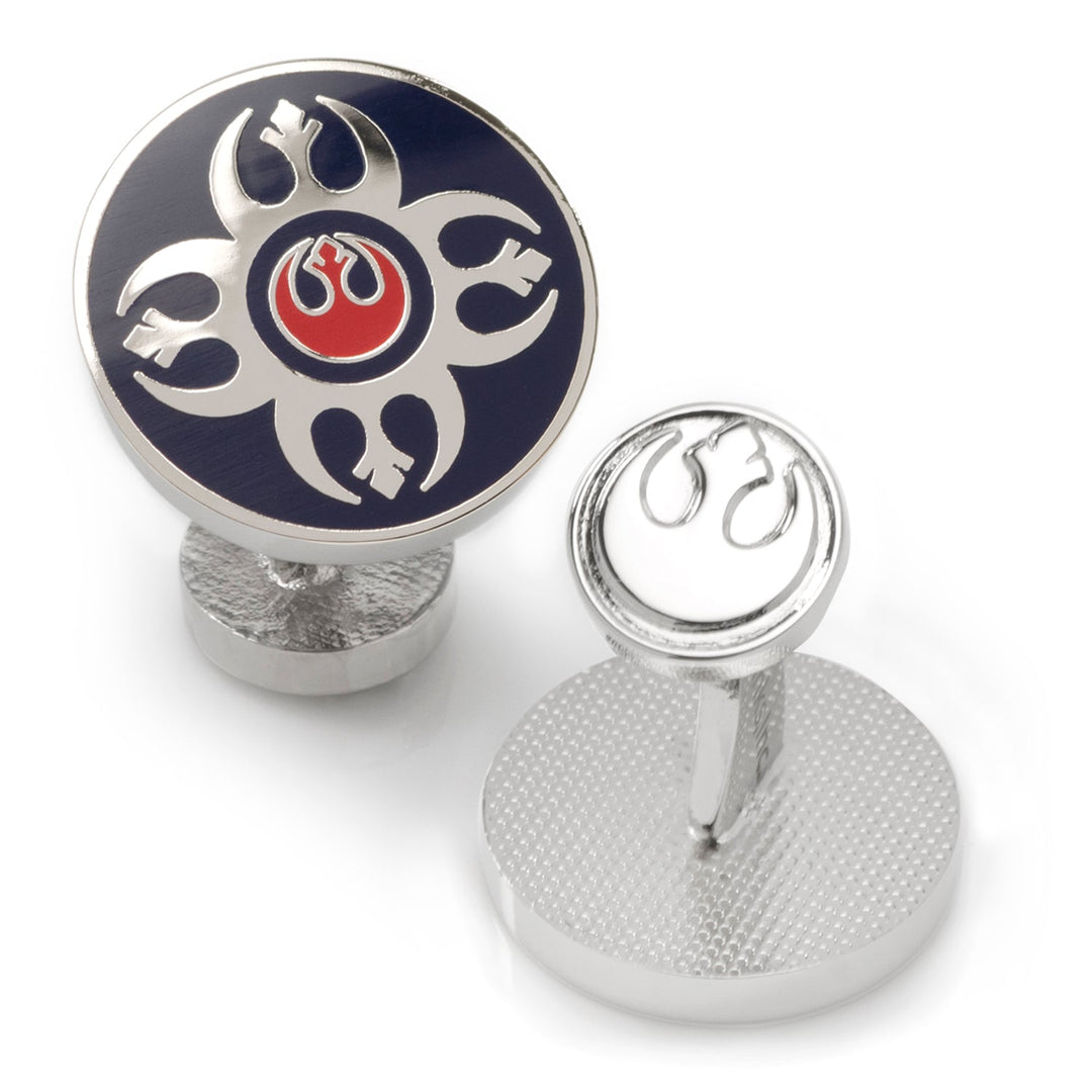 Star Wars Rebel Alliance Starbird Crest Blue and Red Cufflinks: one silver-tone piece features a blue and red starbird crest, while the other is engraved with the same symbol.