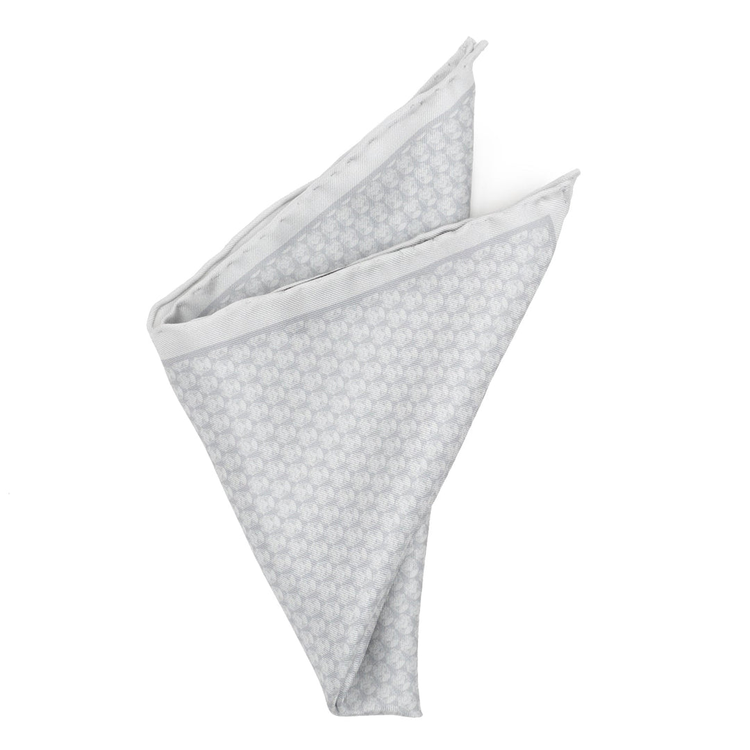 Star Wars Stormtrooper White Silk Pocket Square folded into a triangle, featuring an all-over repeating pattern of light gray Stormtrooper helmets.