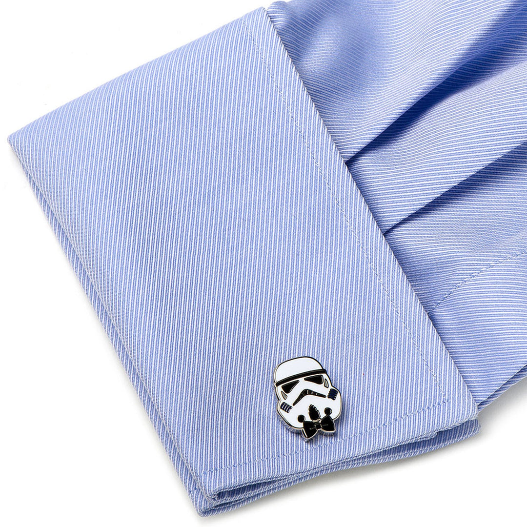 Star Wars Stormtrooper with Bow Tie Cufflinks featured on a folded light blue dress shirt cuff next to a black bow tie.