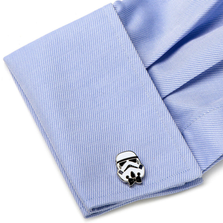 Star Wars Stormtrooper with Bow Tie Cufflinks featured on a folded light blue dress shirt cuff next to a black bow tie.