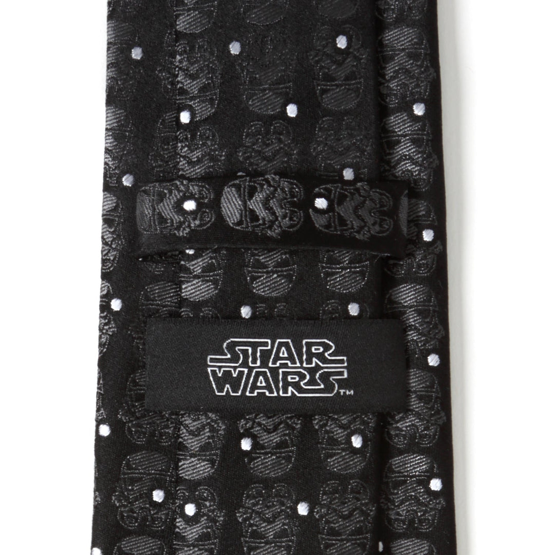 A black Star Wars Stormtrooper Dotted Black Tie featuring a repeating helmet pattern, small white dots, and a brand label on the back.