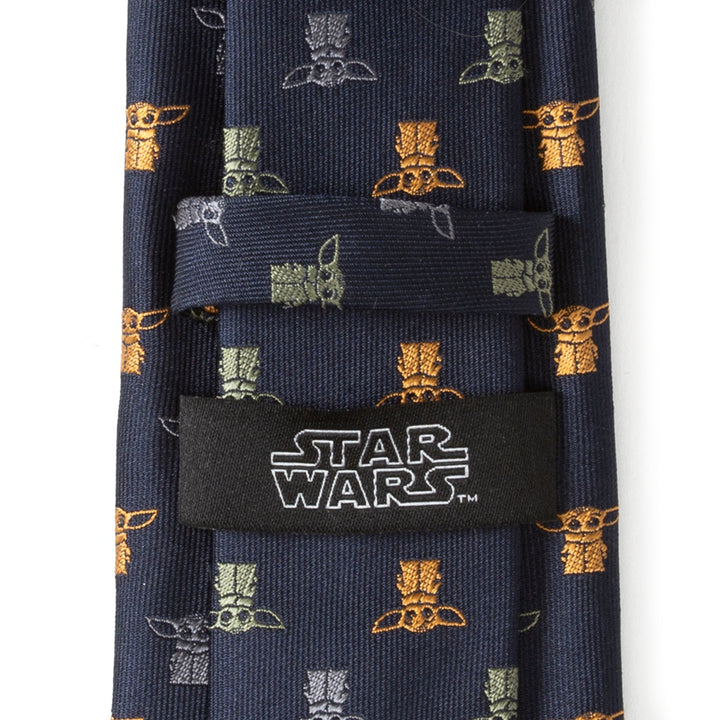 Star Wars Navy Dotted Tie featuring an all-over print of Grogu icons in orange, green, and gray, with a brand label on the keeper loop.