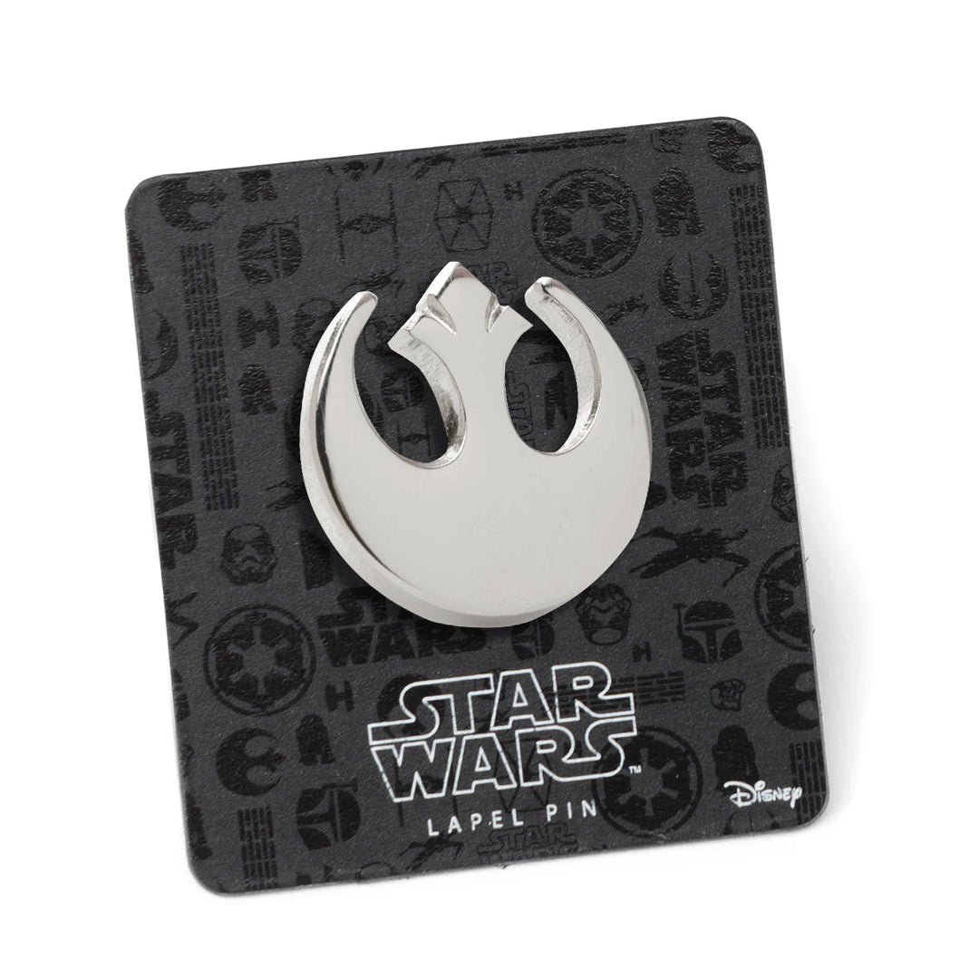 Silver Rebel Alliance lapel pin from the Star Wars Transport 3 Pack Sock &amp; Lapel Pin Gift Set on a black Star Wars themed display card.