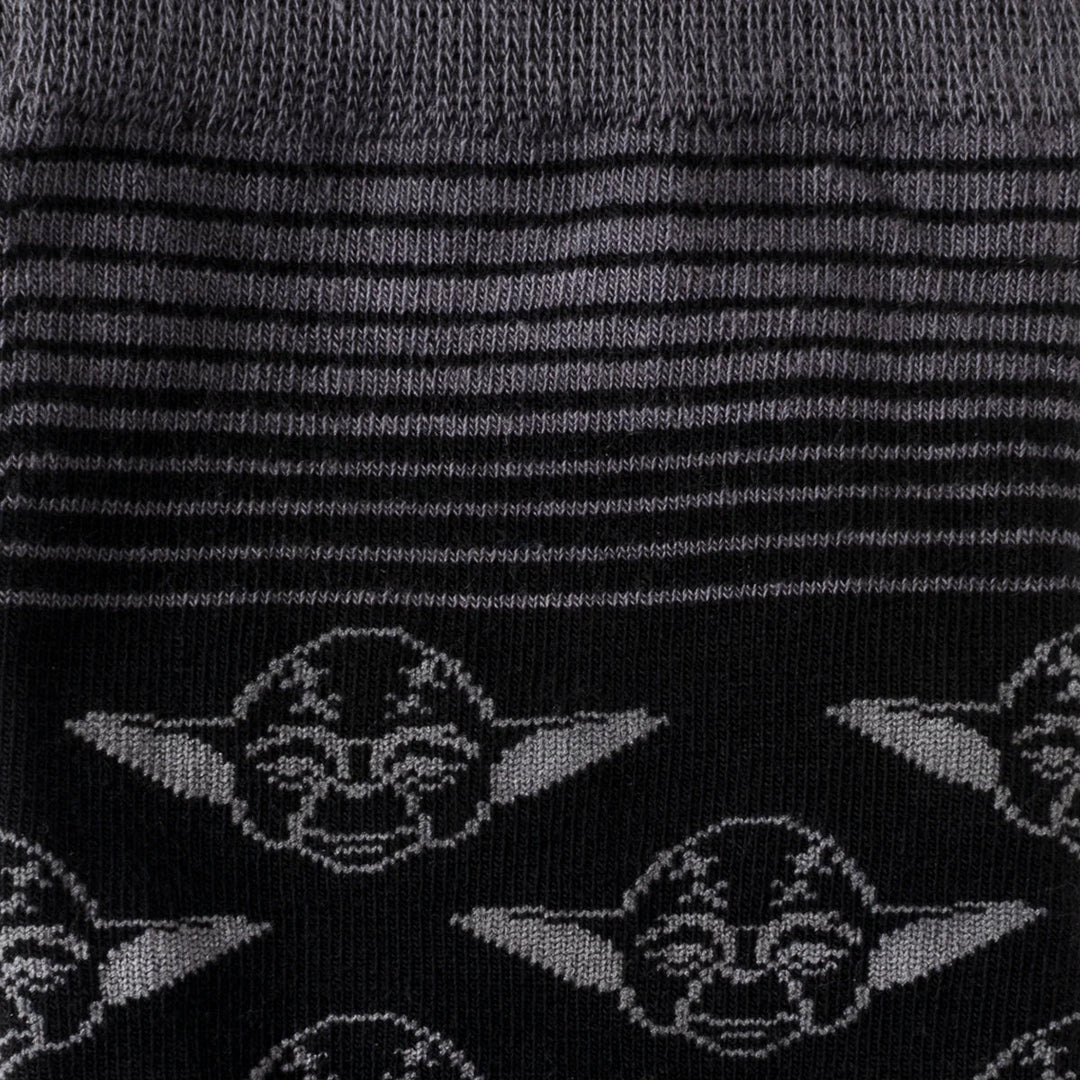 Star Wars Yoda Black Charcoal Dress Socks and Jedi Crest Lapel Pin Gift Set featuring black and gray striped socks with a repeating pattern of Yoda’s face.