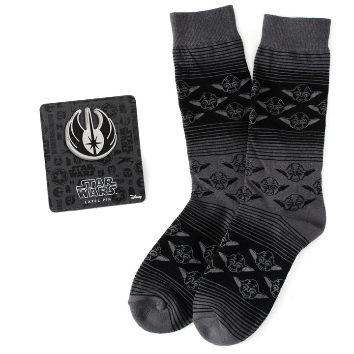 Star Wars Yoda Black Charcoal Dress Socks and Jedi Crest Lapel Pin Gift Set featuring grey and black Yoda socks and a Jedi crest lapel pin on a display card.