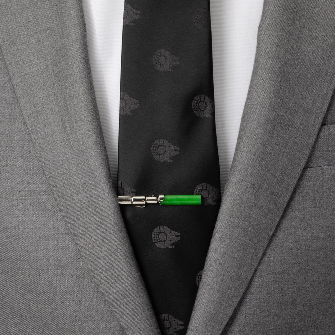 A green and silver Star Wars Yoda LIGHTSABER Tie Clip worn on a black patterned tie with a grey suit jacket.