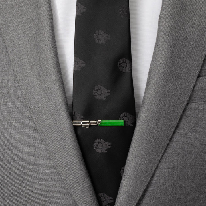 A green and silver Star Wars Yoda LIGHTSABER Tie Clip worn on a black patterned tie with a grey suit jacket.