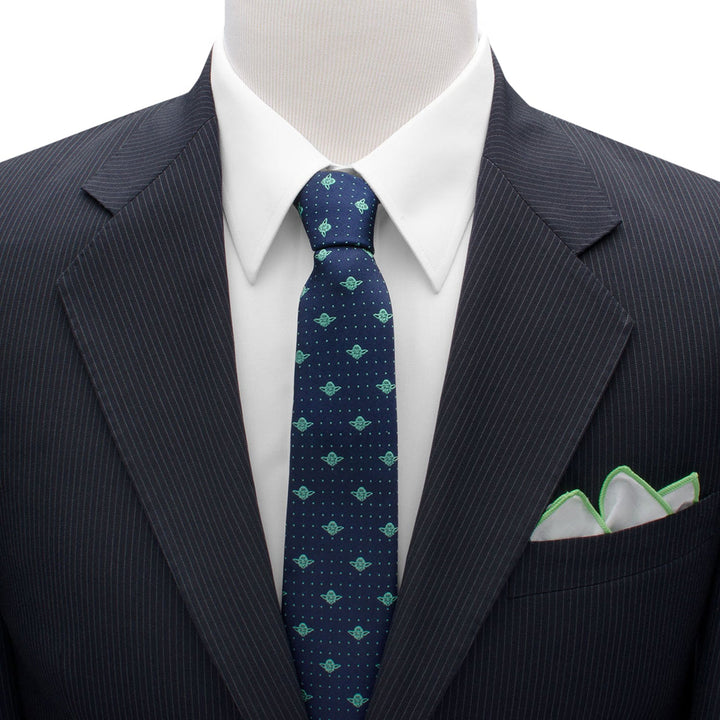 Star Wars Yoda Dotted Navy Tie in navy blue silk with green icons and white dots, worn with a white shirt, pinstriped suit jacket, and white pocket square.