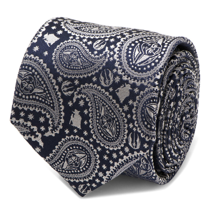 A navy blue Star Wars Yoda Navy Paisley Tie rolled into a coil, featuring a silver paisley pattern interspersed with small Yoda icons and the Rebel Alliance symbol.