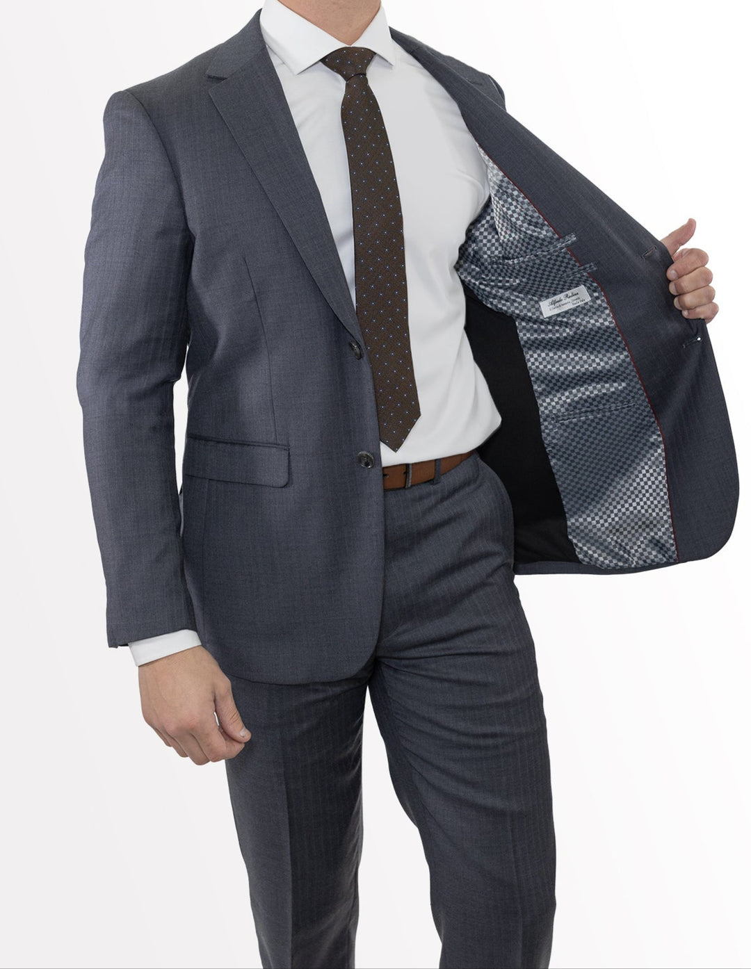 A man is posing in a Douglas Grahame Men&