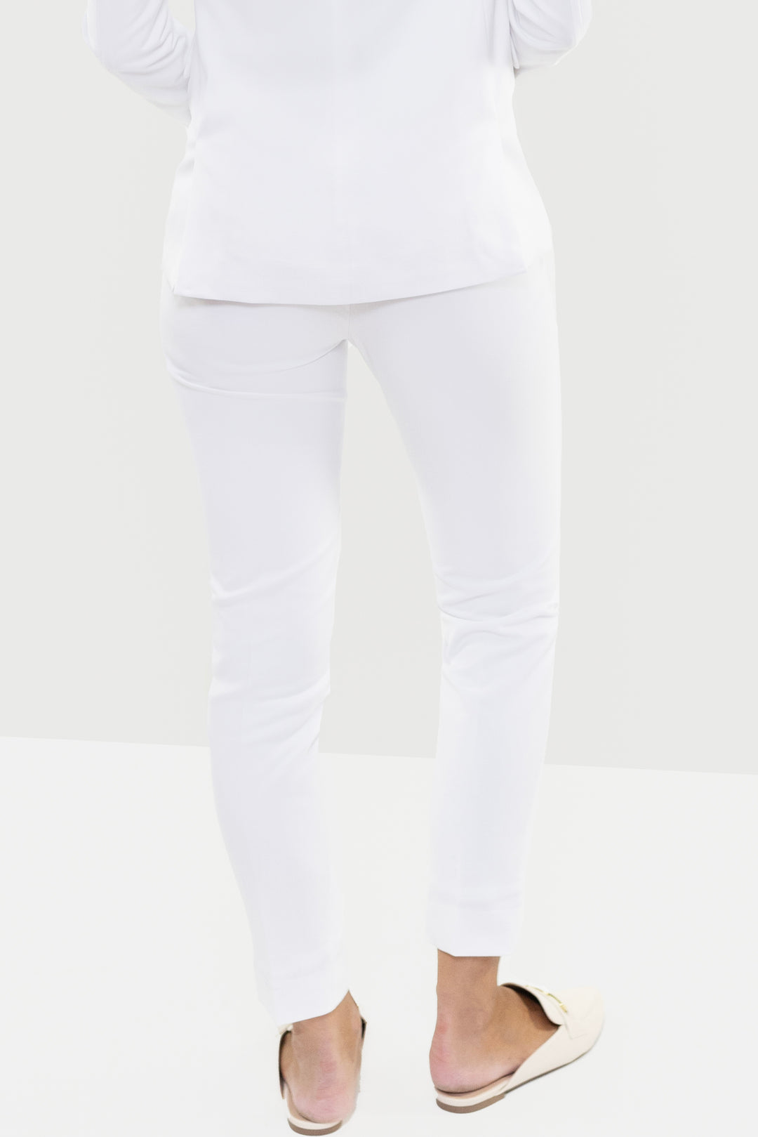 A person is shown from the waist down, wearing Couture 1910&